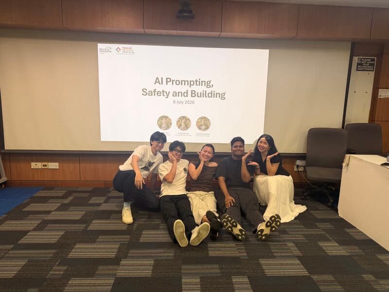 Group photograph at Civil Service College beneath the AI Prompting, Safety and Building slide dated 8 July 2026.